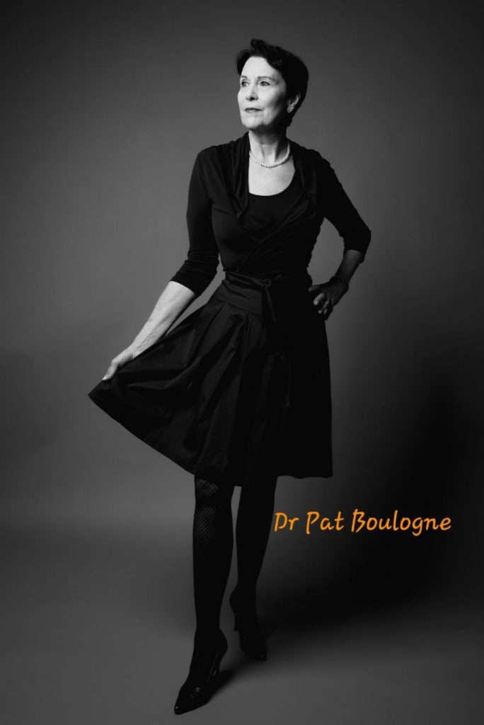 Dr. Pat Boulogne, personal nutritionist and wellness leader, in a powerful black-and-white portrait.